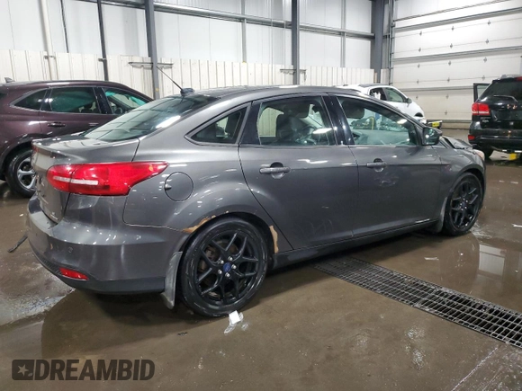 2016 Ford Focus SE z VIN 1FADP3F27GL216059, wystawiony jako Copart lot #59611395 z przebiegiem 170 468 mil mil oraz Szkoda całkowita • Salvage title. Historia ofert i sprzedaży dostępna na DreamBid. Obrazek 3.