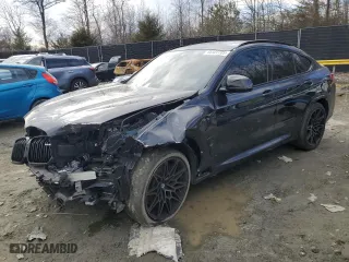 2023 BMW X4 M with VIN 5YM23EC03P9S24918, listed as a Copart auction lot 45127705 with 9817 miles and Salvage Title. Bid and sale history available at carsss.com. Image 1.