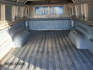1989 Dodge Dakota z VIN 1B7GG26X9KS021432, wystawiony jako Copart lot #78311494 z przebiegiem 106 224 mil mil oraz Nie do naprawy • Non repairable. Historia ofert i sprzedaży dostępna na DreamBid. Obrazek 10.