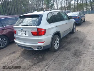 2011 BMW X5 35i with VIN 5UXZV4C53BL403476, listed as a IAAI auction lot 41820844 with 104,472 mi miles. Bid and sale history available at carsss.com. Image 4.