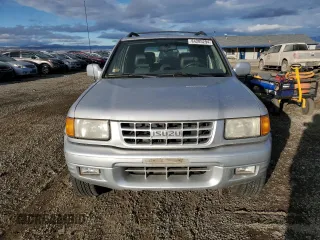 1999 Isuzu Rodeo S z VIN 4S2CM58W8X4339006, wystawiony jako Copart lot #84285294 z przebiegiem 129 191 mil mil oraz Czysty tytuł • Clean title. Historia ofert i sprzedaży dostępna na DreamBid. Obrazek 5.