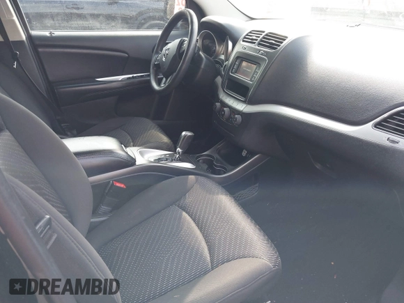 2013 Dodge Journey SE with VIN 3C4PDCAB0DT710609, listed as a IAAI auction lot 41763431 with 145,851 mi miles and . Bid and sale history available at DreamBid. Image 5.