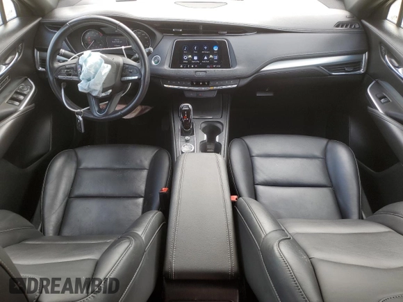 2022 Cadillac XT4 FWD Premium Luxury z VIN 1GYFZCR42NF135325, wystawiony jako Copart lot #43133215 z przebiegiem 48 998 mil mil oraz Szkoda całkowita • Salvage title. Historia ofert i sprzedaży dostępna na DreamBid. Obrazek 8.