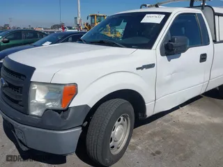 2014 Ford F-150 XL with VIN 1FTNF1CF5EKF62031, listed as a IAAI auction lot 41657632 with 216,689 mi miles. Bid and sale history available at carsss.com. Image 6.