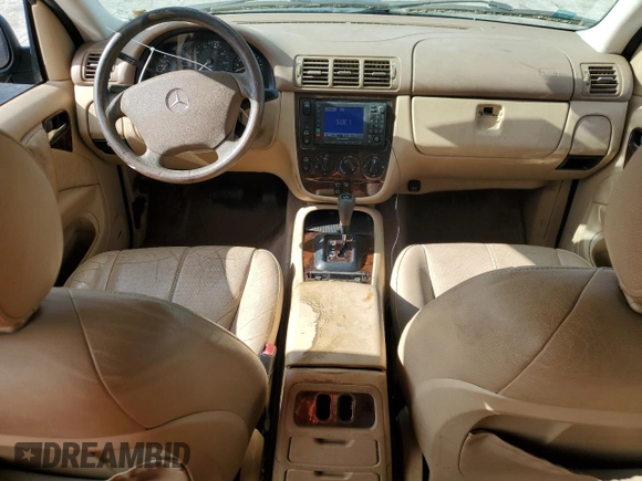 2001 Mercedes-Benz M 320/430/500 with VIN 4JGAB54E41A272057, listed as a Copart auction lot 58197965 with 150,829 mi miles and Salvage title. Bid and sale history available at DreamBid. Image 8.