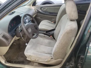 2000 Nissan Maxima GXE z VIN JN1CA31D7YT728277, wystawiony jako Copart lot #54730184 z przebiegiem 131 185 mil mil oraz Czysty tytuł • Clean title. Historia ofert i sprzedaży dostępna na DreamBid. Obrazek 7.