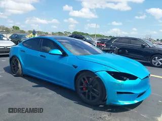 2024 Tesla Model S Plaid z VIN 5YJSA1E64RF540250, wystawiony jako IAAI lot #42197831 z przebiegiem 3 540 mil mil oraz . Historia ofert i sprzedaży dostępna na DreamBid. Obrazek 1.