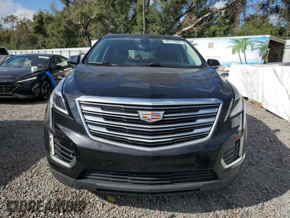 2017 Cadillac XT5 Premium Luxury FWD z VIN 1GYKNCRS7HZ130553, wystawiony jako Copart lot #60337905 z przebiegiem Nie podano mil oraz Szkoda całkowita • Salvage title. Historia ofert i sprzedaży dostępna na DreamBid. Obrazek 5.