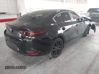 2024 Mazda 3 S Select Sport with VIN 3MZBPABM1RM408945, listed as a IAAI auction lot 42398805 with 42,283 mi miles and . Bid and sale history available at DreamBid. Image 4.