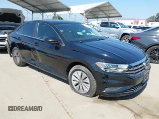 2019 Volkswagen Jetta S z VIN 3VWC57BU9KM112526, wystawiony jako IAAI lot #42222531 z przebiegiem 55 977 mil mil oraz . Historia ofert i sprzedaży dostępna na DreamBid. Obrazek 1.