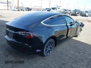 2019 Tesla Model 3 Mid Range with VIN 5YJ3E1EA1KF410297, listed as a IAAI auction lot 41841991 with 176,254 mi miles. Bid and sale history available at carsss.com. Image 4.