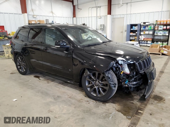 2019 Jeep Grand Cherokee Overland with VIN 1C4RJFCT8KC610341, listed as a Copart auction lot 83424454 with 57,356 mi miles and Salvage Title. Bid and sale history available at carsss.com. Image 4.
