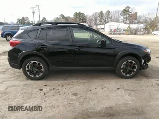 2022 Subaru Crosstrek Premium z VIN JF2GTACC6NG259352, wystawiony jako IAAI lot #41787631 z przebiegiem 43 394 mil mil oraz . Historia ofert i sprzedaży dostępna na DreamBid. Obrazek 14.