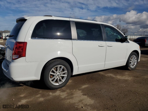 2019 Dodge Grand Caravan SXT with VIN 2C4RDGCG9KR743360, listed as a Copart auction lot 81699554 with 82,527 mi miles and Salvage Title. Bid and sale history available at carsss.com. Image 3.