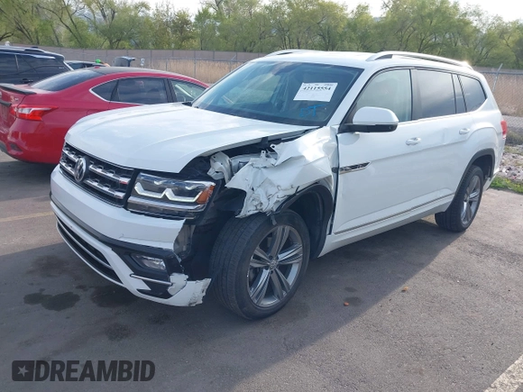 2018 Volkswagen Atlas SE z VIN 1V2FR2CA2JC540657, wystawiony jako IAAI lot #42115554 z przebiegiem 107 309 mil mil oraz . Historia ofert i sprzedaży dostępna na DreamBid. Obrazek 17.
