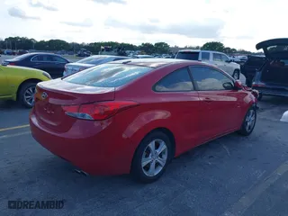 2013 Hyundai Elantra Coupe GS with VIN KMHDH6AE2DU012829, listed as a IAAI auction lot 41503736 with 89,859 mi miles. Bid and sale history available at carsss.com. Image 4.