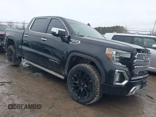 2019 GMC Sierra 1500 Denali z VIN 1GTU9FEL0KZ136480, wystawiony jako IAAI lot #41704074 z przebiegiem 79 215 mil mil oraz . Historia ofert i sprzedaży dostępna na DreamBid. Obrazek 1.