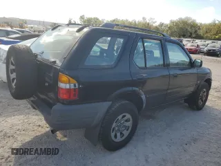 1999 Isuzu Rodeo S with VIN 4S2CK58W7X4357230, listed as a Copart auction lot 85214894 with 130,370 mi miles and Salvage title. Bid and sale history available at DreamBid. Image 3.