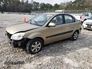 2009 Kia Rio LX with VIN KNADE223296470687, listed as a Copart auction lot 48385925 with 176,400 mi miles and Salvage Title. Bid and sale history available at DreamBid. Image 1.