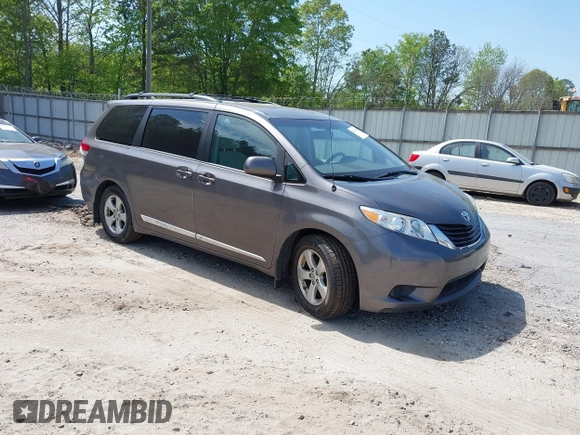 2014 Toyota Sienna LE AAS with VIN 5TDKK3DC4ES431664, listed as a IAAI auction lot 42081429 with 208,505 mi miles and . Bid and sale history available at carsss.com. Image 1.