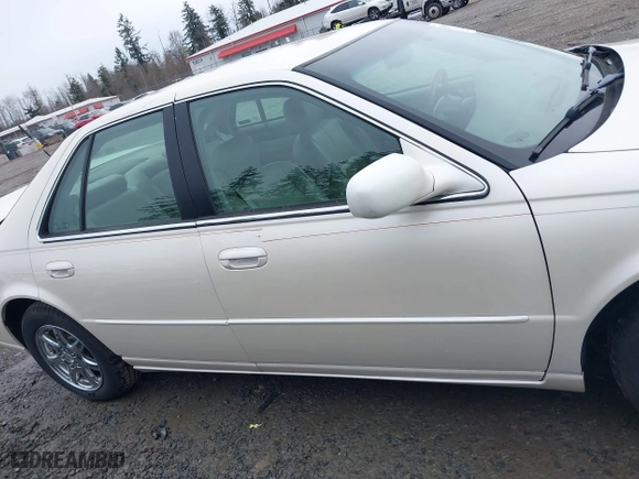 2003 Cadillac Seville Luxury SLS with VIN 1G6KS54Y43U120481, listed as a IAAI auction lot 41637413 with 46,598 mi miles. Bid and sale history available at carsss.com. Image 13.