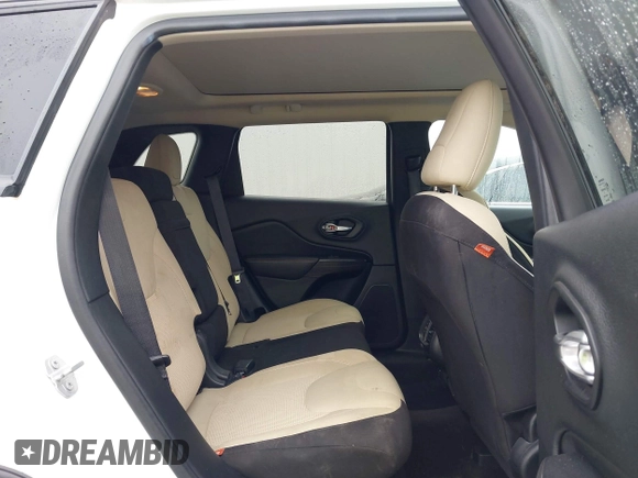 2017 Jeep Cherokee Latitude with VIN 1C4PJLCB5HW571941, listed as a IAAI auction lot 41156440 with 135,862 mi miles and . Bid and sale history available at DreamBid. Image 8.