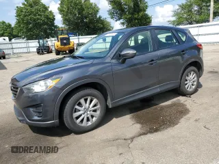2016 Mazda CX-5 Sport z VIN JM3KE2BY4G0632946, wystawiony jako Copart lot #61447435 z przebiegiem 178 492 mil mil oraz Szkoda całkowita • Salvage title. Historia ofert i sprzedaży dostępna na DreamBid. Obrazek 1.
