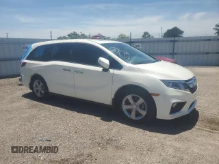 2018 Honda Odyssey EX-L z VIN 5FNRL6H78JB104144, wystawiony jako Copart lot #51513935 z przebiegiem 76 507 mil mil oraz Szkoda całkowita • Salvage title. Historia ofert i sprzedaży dostępna na DreamBid. Obrazek 4.