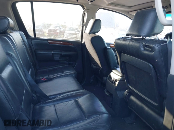 2009 Infiniti QX56 with VIN 5N3AA08D69N904172, listed as a IAAI auction lot 41756378 with 209,031 mi miles. Bid and sale history available at carsss.com. Image 8.