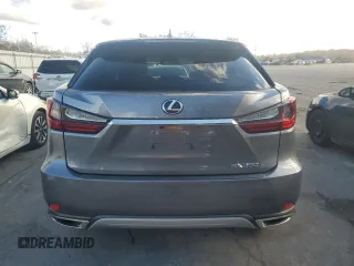 2021 Lexus RX with VIN 2T2AZMDA7MC275120, listed as a Copart auction lot 80251094 with 8,595 mi miles and Salvage Title. Bid and sale history available at carsss.com. Image 6.