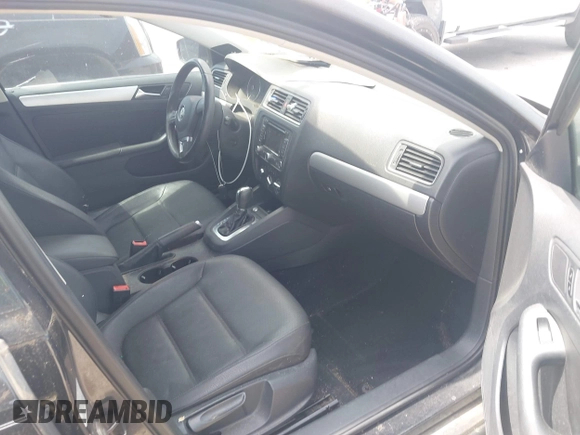2012 Volkswagen Jetta TDI w/Premium with VIN 3VWLL7AJ0CM360730, listed as a IAAI auction lot 42029644 with 159,074 mi miles and . Bid and sale history available at DreamBid. Image 5.