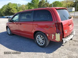 2014 Dodge Grand Caravan SXT with VIN 2C4RDGCG5ER182160, listed as a Copart auction lot 54140505 with 61,576 mi miles and Salvage Title. Bid and sale history available at DreamBid. Image 2.