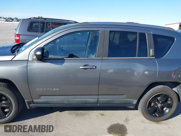 2011 Jeep Compass with VIN 1J4NT1FA0BD246586, listed as a IAAI auction lot 41253630 with 120,540 mi miles. Bid and sale history available at carsss.com. Image 14.