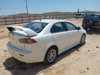 2016 Mitsubishi Lancer ES z VIN JA32U2FU4GU011507, wystawiony jako IAAI lot #42347943 z przebiegiem 128 965 mil mil oraz . Historia ofert i sprzedaży dostępna na DreamBid. Obrazek 4.
