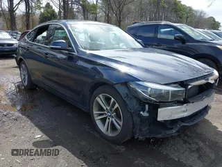 2018 BMW 3 Series 330i xDrive with VIN WBA8Z9C54JG828207, listed as a IAAI auction lot 42000931 with 73,736 mi miles. Bid and sale history available at carsss.com. Image 1.