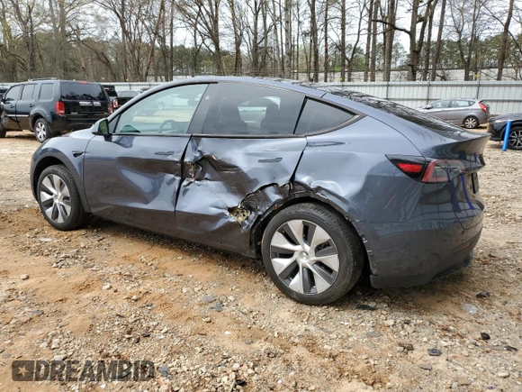 2023 Tesla Model Y Long Range z VIN 7SAYGDEE5PA164270, wystawiony jako Copart lot #50260835 z przebiegiem 17 340 mil mil oraz Szkoda całkowita • Salvage title. Historia ofert i sprzedaży dostępna na DreamBid. Obrazek 2.
