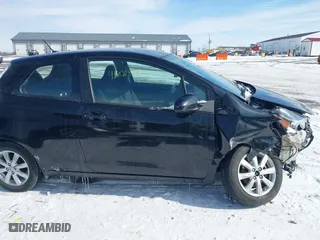 2015 Toyota Yaris L with VIN VNKJTUD34FA055116, listed as a IAAI auction lot 41601874 with 84,508 mi miles. Bid and sale history available at carsss.com. Image 13.
