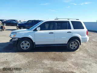 2004 Honda Pilot EX with VIN 2HKYF185X4H592684, listed as a IAAI auction lot 41649752 with 1 mi miles. Bid and sale history available at carsss.com. Image 15.