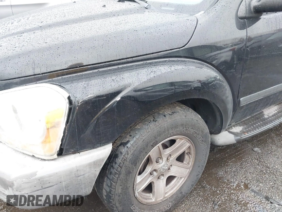 2005 Dodge Durango SXT with VIN 1D4HB38N35F554011, listed as a IAAI auction lot 40873398 with 170,538 mi miles and . Bid and sale history available at DreamBid. Image 6.