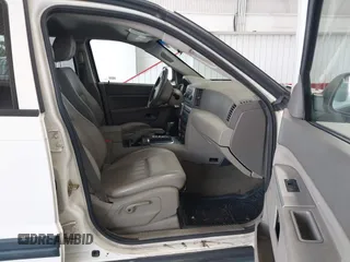 2005 Jeep Grand Cherokee Laredo with VIN 1J4GR48K25C599307, listed as a IAAI auction lot 42705166 with 231,747 mi miles and . Bid and sale history available at DreamBid. Image 5.