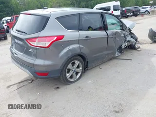 2014 Ford Escape SE with VIN 1FMCU9G97EUB27835, listed as a IAAI auction lot 42530986 with 137,933 mi miles and . Bid and sale history available at DreamBid. Image 4.