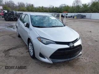2019 Toyota Corolla L with VIN 5YFBURHE2KP934042, listed as a IAAI auction lot 41963491 with 87,299 mi miles. Bid and sale history available at carsss.com. Image 1.