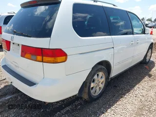 2003 Honda Odyssey EX-L with VIN 5FNRL18983B122294, listed as a IAAI auction lot 41922671 with 215,911 mi miles and . Bid and sale history available at DreamBid. Image 4.