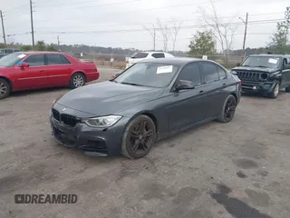 2014 BMW 3 Series 335i with VIN WBA3A9C56EF479564, listed as a IAAI auction lot 41578397 with 136,637 mi miles. Bid and sale history available at carsss.com. Image 2.