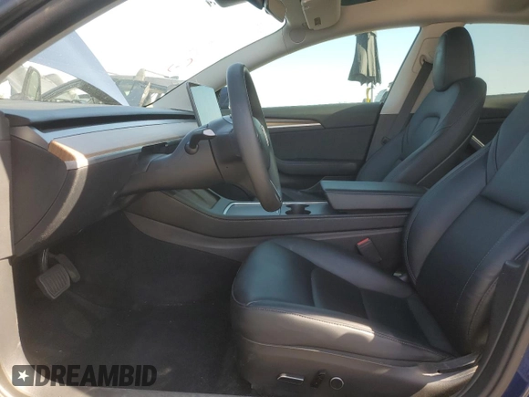 2023 Tesla Model 3 Long Range with VIN 5YJ3E1EB3PF633070, listed as a Copart auction lot 48942545 with 38,332 mi miles and Salvage Title. Bid and sale history available at DreamBid. Image 7.