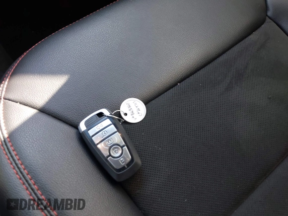 2022 Ford Explorer ST-Line z VIN 1FMSK7KH9NGB68860, wystawiony jako IAAI lot #42287420 z przebiegiem 25 579 mil mil oraz . Historia ofert i sprzedaży dostępna na DreamBid. Obrazek 11.