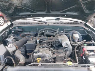 2003 Toyota Tacoma z VIN 5TEWM72N03Z296853, wystawiony jako IAAI lot #42385361 z przebiegiem 132 149 mil mil oraz . Historia ofert i sprzedaży dostępna na DreamBid. Obrazek 10.