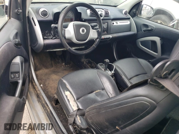 2012 Smart fortwo Pure с VIN WMEEJ3BA1CK573090, выставлен на аукционе Copart как лот 59881025 с пробегом 128 086 миль миль и Чистый • Clean title. История ставок и продаж доступна на DreamBid. Изображение 8.
