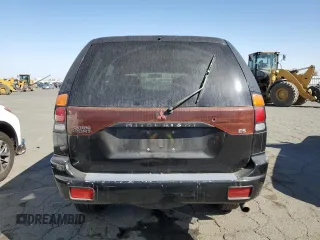 2001 Mitsubishi Montero ES z VIN JA4LS21H11P045183, wystawiony jako Copart lot #73702024 z przebiegiem 263 746 mil mil oraz Szkody całkowita. Historia ofert i sprzedaży dostępna na DreamBid. Obrazek 6.