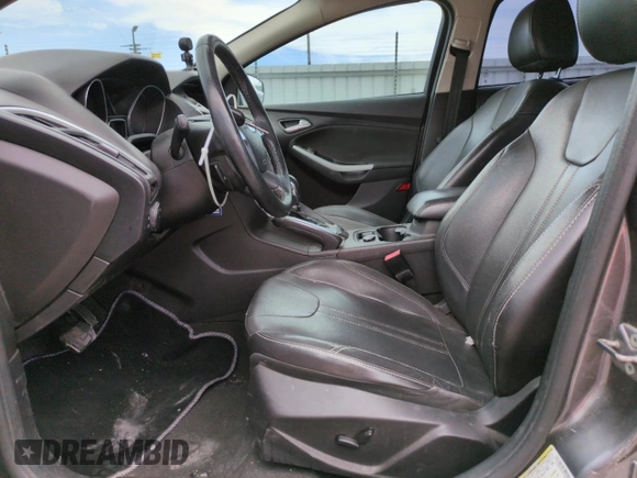 2013 Ford Focus SE with VIN 1FADP3F24DL189897, listed as a Copart auction lot 61970155 with 212,218 mi miles and Salvage title. Bid and sale history available at DreamBid. Image 7.